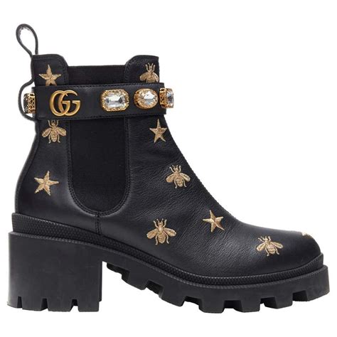 gucci black boots with bees.